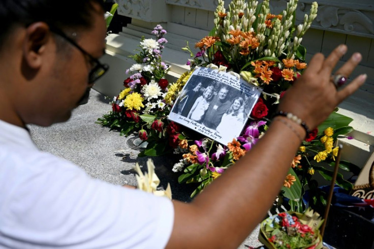 A Balinese mourner prays at the memorial for victims of the 2002 Bali bombings -- most of the dead were foreign tourists but 38 Indonesians also died