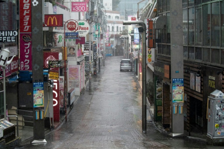 Takeshita Street, one of the most crowded and well-known shopping areas in Tokyo, was completely deserted in the city's Harajuku district as Typhoon Hagibis began to hit the Japanese capital
