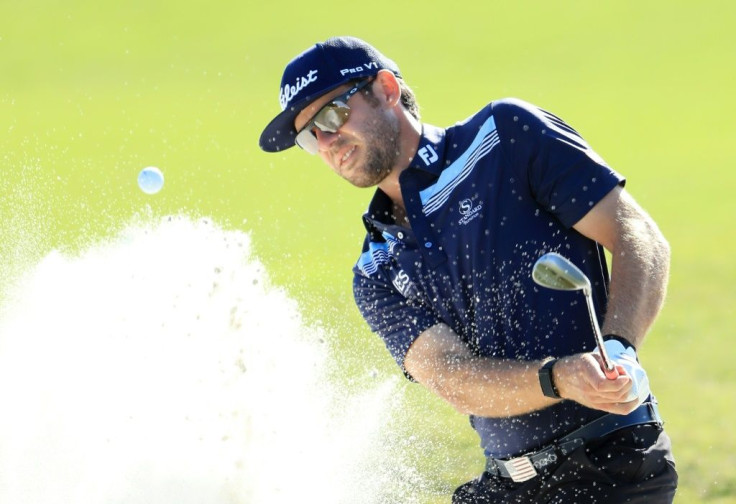 American Lanto Griffin plays a shot from a bunker on the way to the 54-hole lead in the US PGA Tour Houston Open