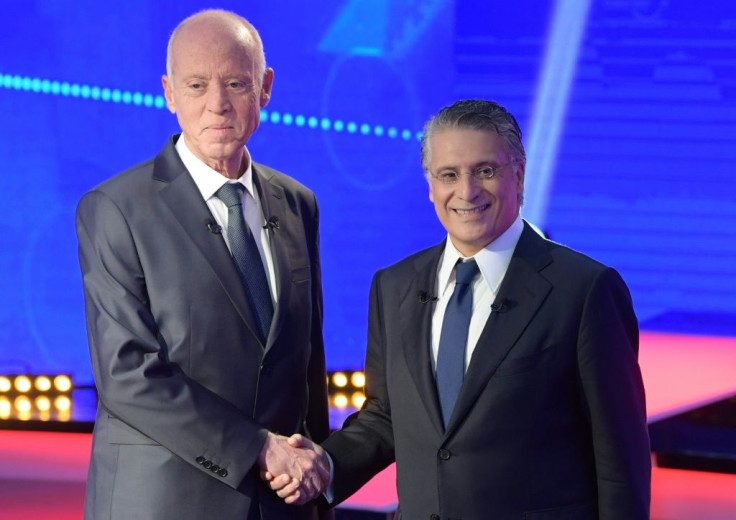 Conservative law professor Kais Saied (L) and business tycoon Nabil Karoui (R) go head-to-head in Tunisia's runoff presidential election