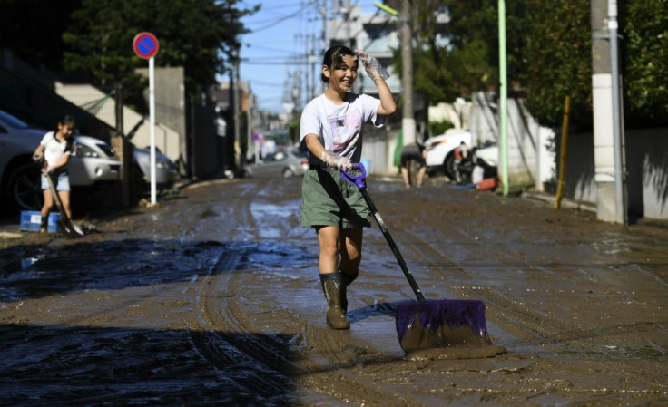 Residents of Kawasaki start the cleanup after floodwaters recede