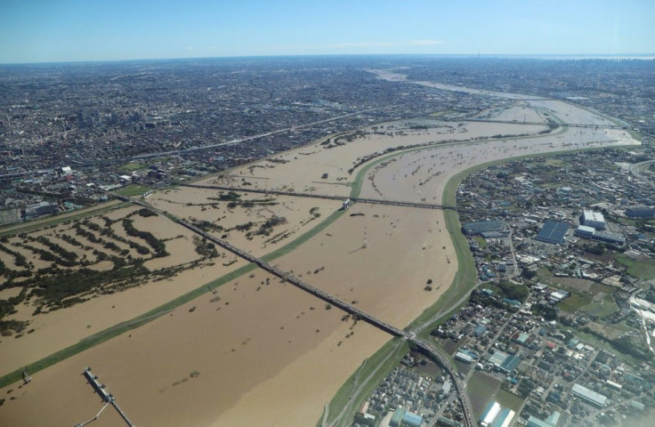 Typhoon Hagibis dumped "unprecedented" rain that caused rivers to swell and in some cases burst their banks