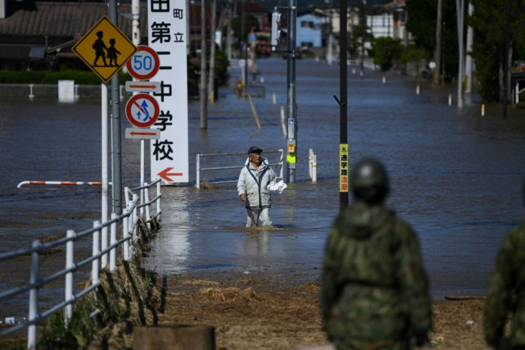 Japan's military has been deployed to rescue people trapped in areas hit by flooding after Typhoon Hagibis
