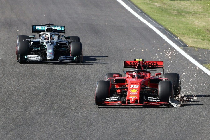 Charles Leclerc's front wing was damaged and with bits flying off in all directions, one demolishing the wing mirror of Mercedes' driver Lewis Hamilton behind him