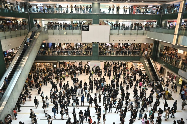 Protestors held flashmob gatherings in shopping malls across Hong Kong