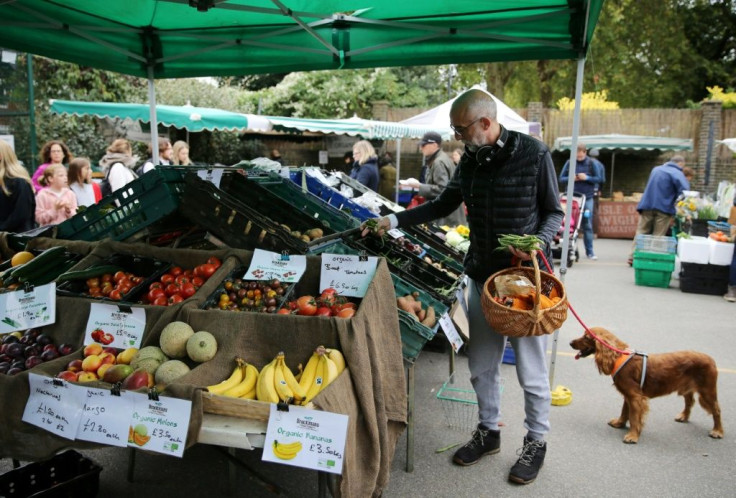 Fans of organic produce wander among the stalls at The Spread farmers' market in the trendy Primrose Hill area of London