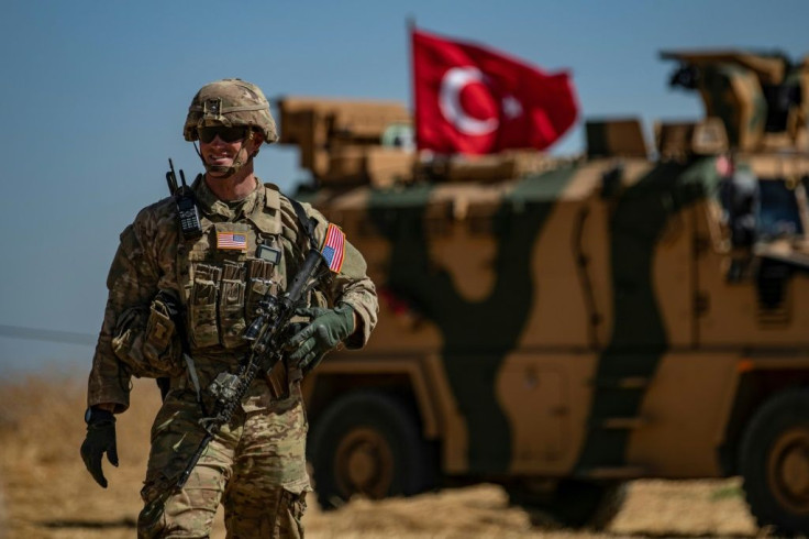 US troops like this soldier pictured in the Syrian village of al-Hashisha on September 8 2019 number around 1,000 in total in Syria
