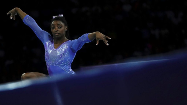 Simone Biles won the floor title for the fifth time in her career at the world gymnastics championships on Sunday in Stuttgart