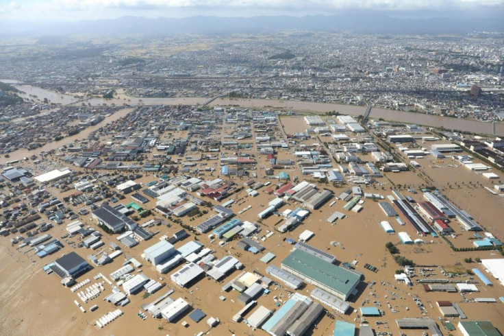 Typhoon Hagibis caused transport chaos over a holiday weekend in Japan, grounding flights and halting trains