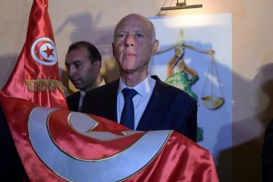 Official results in Tunisia's presidential election set to be released Monday are expected to seal a landslide victory for conservative political outsider Kais Saied