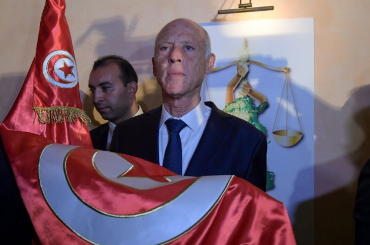 Official results in Tunisia's presidential election set to be released Monday are expected to seal a landslide victory for conservative political outsider Kais Saied