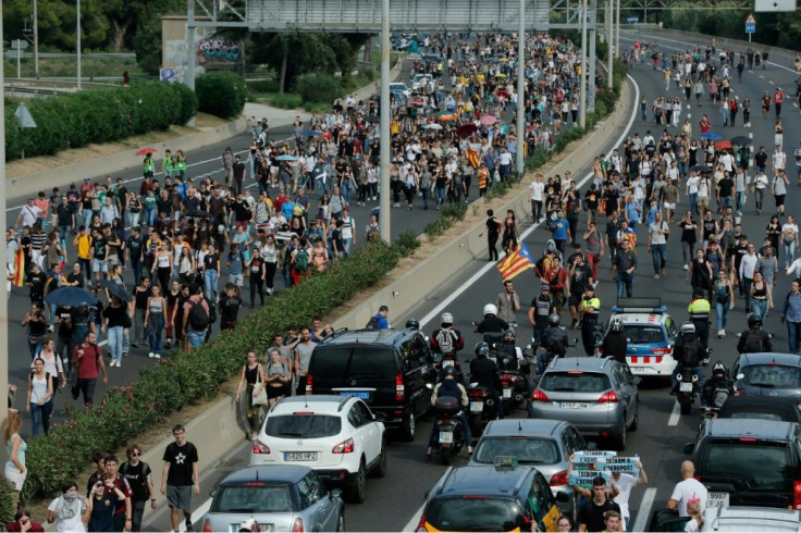 Thousands of protesters began walking towards Barcelona's El Prat airport in the hope of blocking it following the verdict