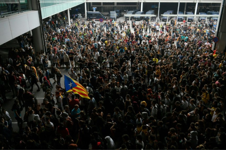 Thousands converged on Barcelona's El Prat airport in a bid to block off access