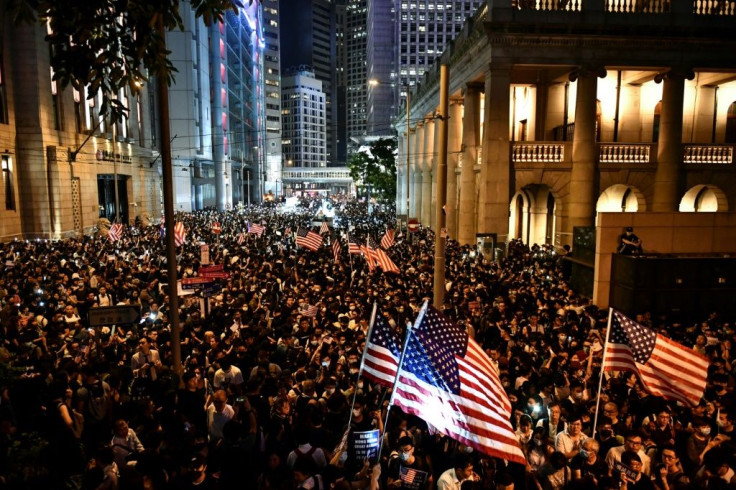 Hong Kong pro-democracy protesters rally in suport of the Human Rights and Democracy Act, a US bill that could dramatically alter Washington's relationship with the semi-autonomous trading hub