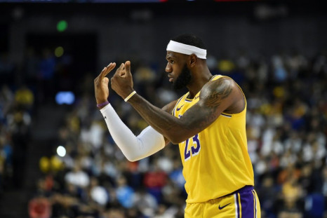 Los Angeles Lakers superstar LeBron James gestures while playing against the Brooklyn Nets on October 10, 2019 at the Mercedes-Benz Arena in Shanghai, China