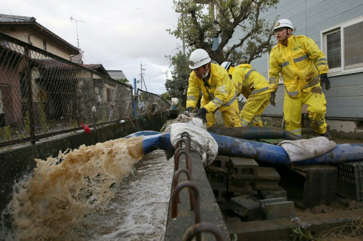 Pumping operations were being carried out where floodwaters submerged homes and vehicles after Typhoon Hagibis