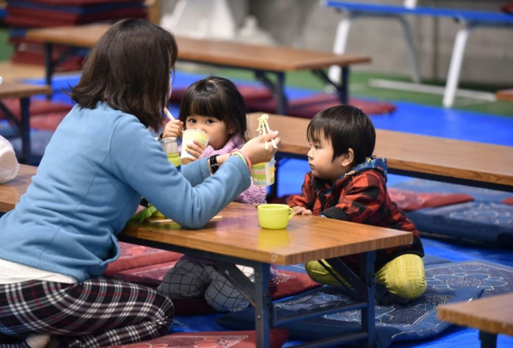 Tens of thousands of people have been forced to sleep in shelters after Typhoon Hagibis pounded Japan