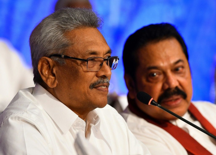 Sri Lankan presidential candidate Gotabhaya Rajapakse (left) with his brother, former president Mahinda Rajapakse during a press conference in Colombo