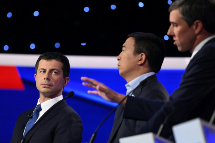 Democratic presidential hopeful Pete Buttigieg, the mayor of South Bend, Indiana (L) entrepreneur Andrew Yang (C) and ex-congressman Beto O'Rourke at the fourth Democratic primary debate of the 2020 presidential race