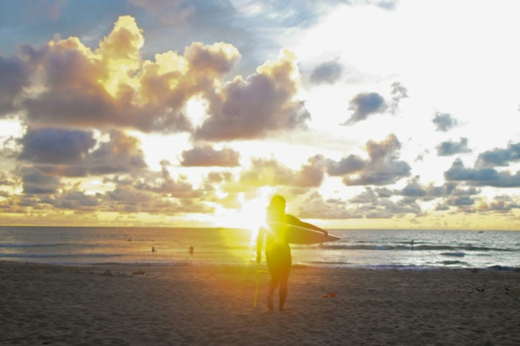 The mild waves at Ngwe Saung beach in Myanmar present a paradox for competitive surfers -- they are good to learn on but much tamer than the conditions in surfing hotspots