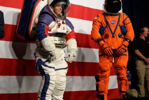 Prototypes of the Orion Crew Survival Suit (R), which will be worn on the way to the Moon, and the Exploration Extravehicular Mobility Unit (xEMU) to be worn on the surface