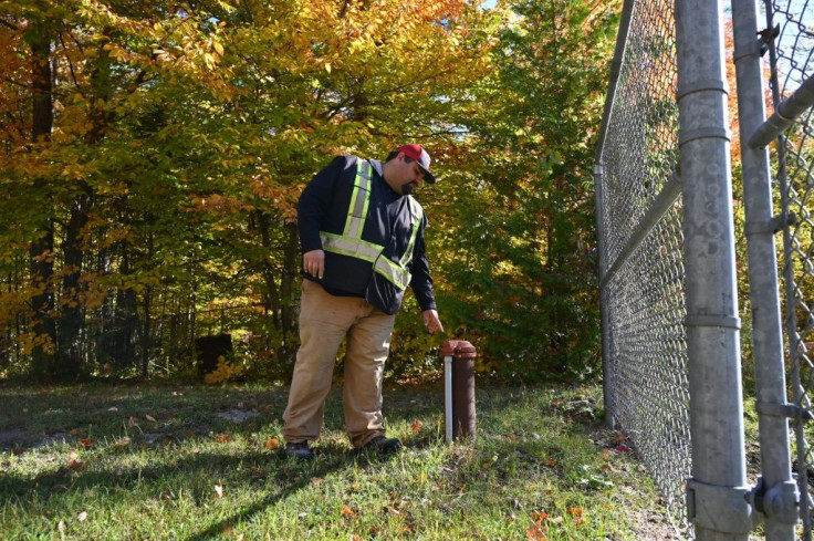 Curve Lake First Nation official Richard Taylor shows a well outside a water treatment facility in Curve Lake, Canada