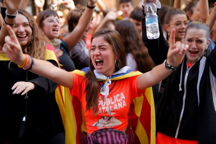 Around 25,000 students rallied in central Barcelona as they began a strike in protest over the verdicts