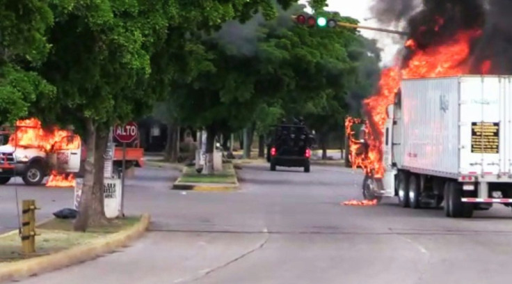 Trucks burn in Culiacan, capital of jailed Mexican druglord Joaquin "El Chapo" Guzman's home state of Sinaloa, on October 17, 2019
