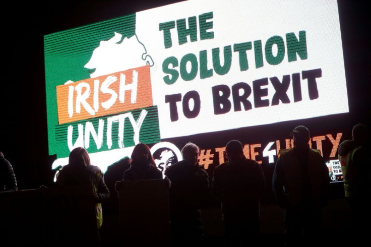 Demonstrators hold an anti-No Deal Brexit protest at the Carrickcarnon border crossing between Ireland and Northern Ireland