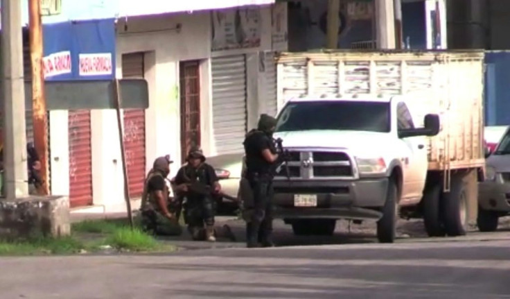 Gunmen take position in Culiacan, Mexico, where security forces arrested one son of jailed drug kingpin Joaquin "El Chapo" Guzman