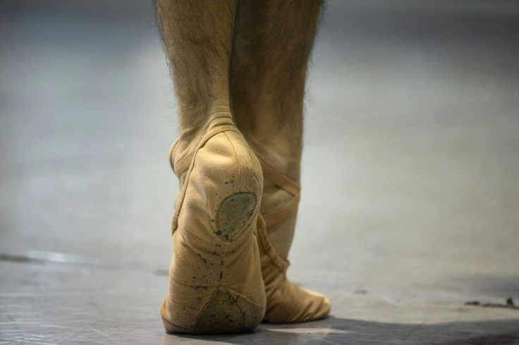 A dancer taking part in rehearsals