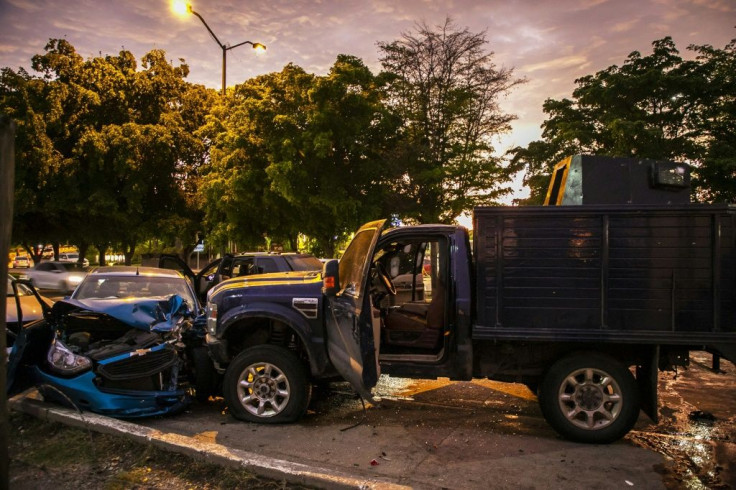 Attempts to seize Guzman's son triggered an hours-long battle that left blazing vehicles strewn across the street and sent terrified residents running for shelter