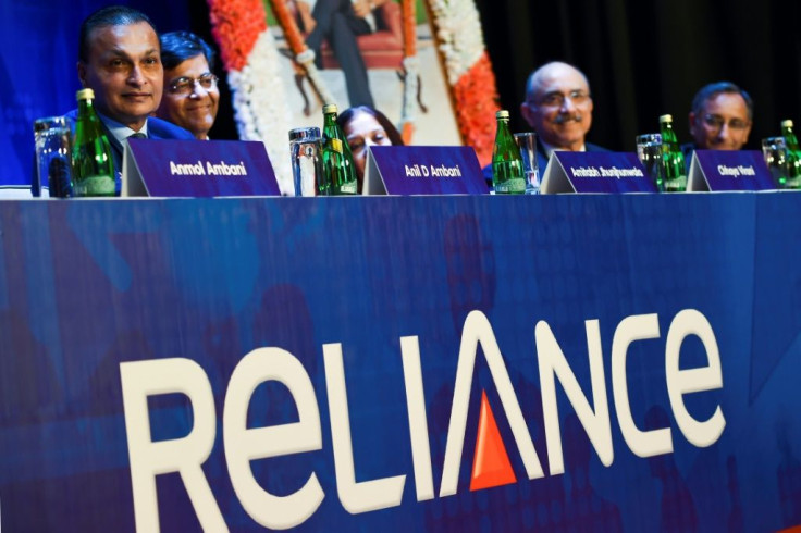 Reliance owner Anil Ambani (L) is in fierce competition with Amazon and Walmart for India's e-commerce market