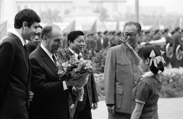Chinese Premier Zhao Ziyang (R) and a Chinese girl greet French President Francois Mitterrand on May 3, 1983 at Beijing's Tiananmen Square -- where troops six years later cracked down on democracy protests despite opposition from Zhao
