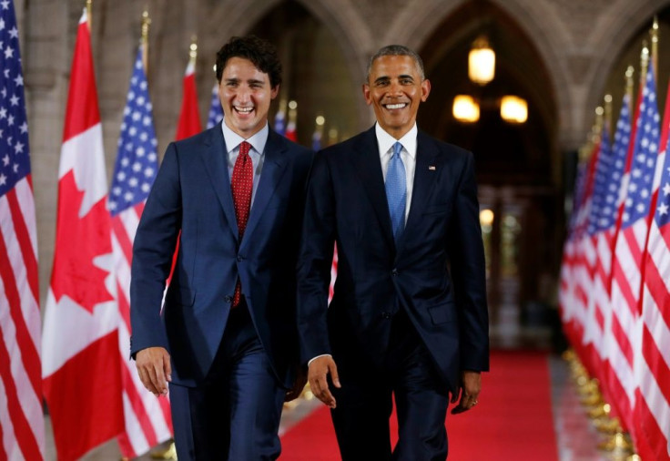 Former US president Barack Obama (R) has endorsed Canadian Prime Minister Justin Trudeau (L) for another term -- the pair are seen in Ottawa in June 2016