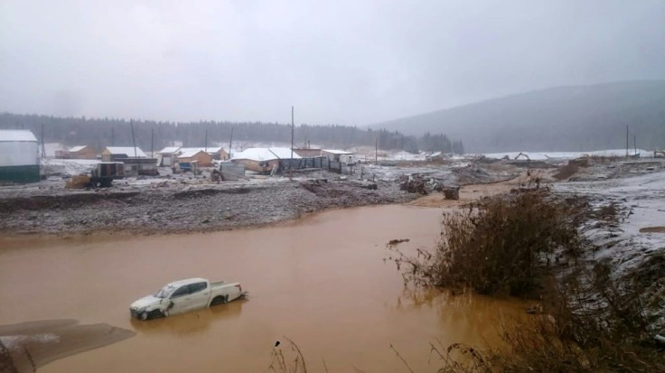 Investigators said they opened a criminal probe into the violation of safety rules after the collapse of a dam in Siberia