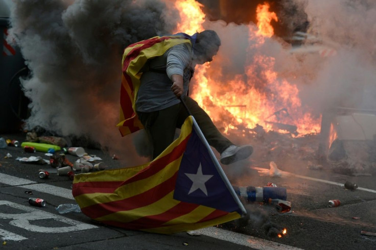 Radical Catalan separatists and police clashed in Barcelona overnight Friday, injuring more than 150 people