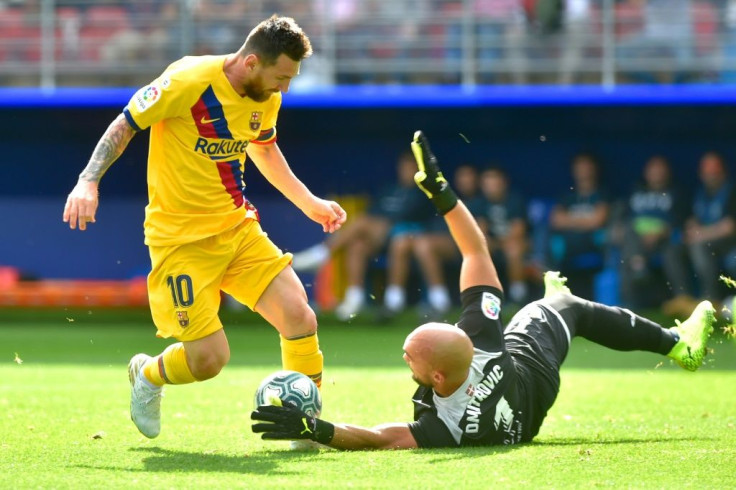 Eibar goalkeeper Marko Dmitrovic stopped Lionel Messi once, but the Barcelona striker then scored his second goal of the season