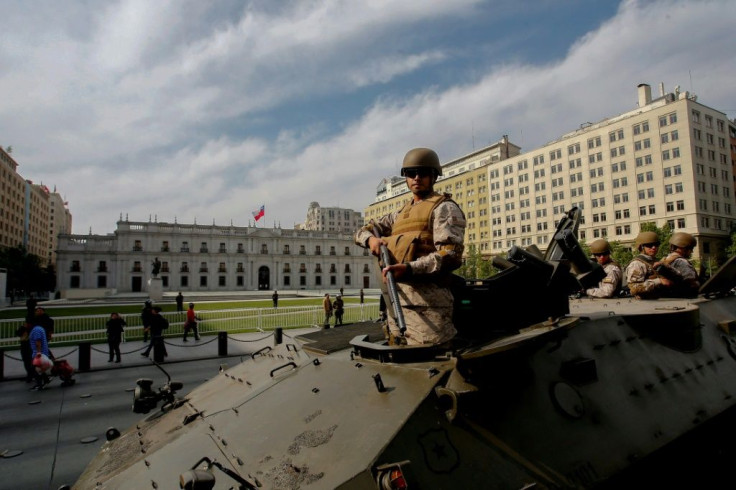 Photo released by Aton of soldiers outside La Moneda presidential palace in Santiago on October 19, 2019