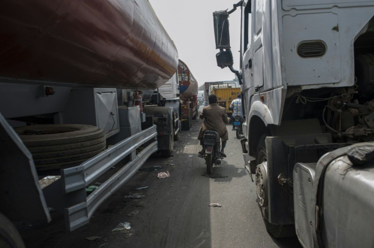 Trucks wait in line to get to Lagos port. The facility has a poor reputation for efficiency and corruption