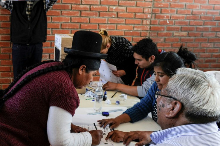 An Aymara woman casts her vote in La Paz