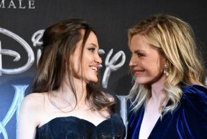 Actors Angelina Jolie (L) and Michelle Pfeiffer pose during the European premiere of Disney's fantasy adventure film "Maleficent: Mistress of Evil" on October 7, 2019 in Rome