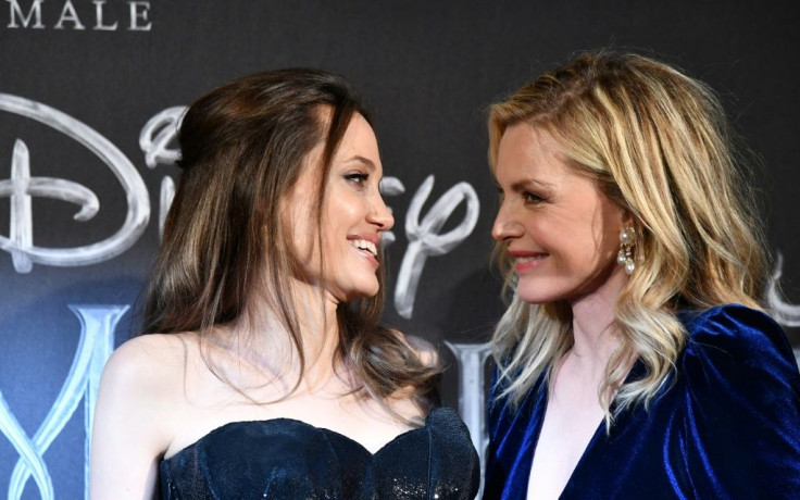 Actors Angelina Jolie (L) and Michelle Pfeiffer pose during the European premiere of Disney's fantasy adventure film "Maleficent: Mistress of Evil" on October 7, 2019 in Rome