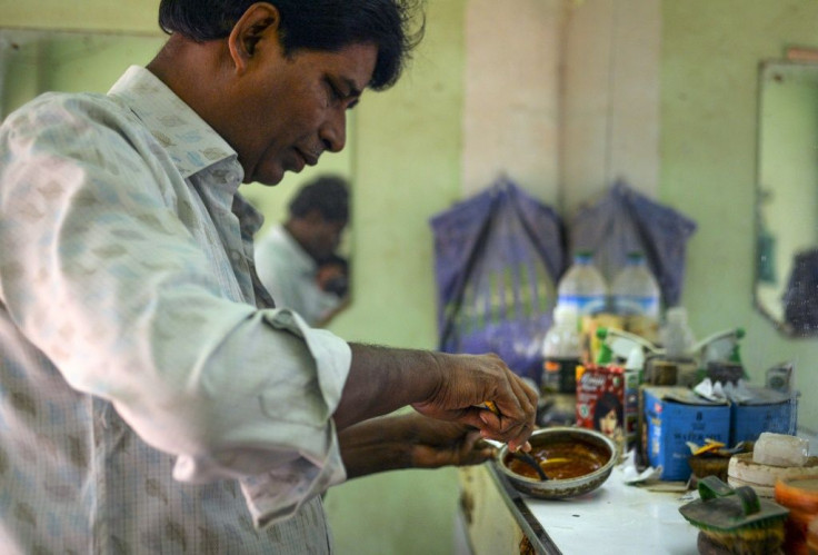 The new trend has also boosted barbers' fortunes -- more men feel compelled to dye their hair at the salon
