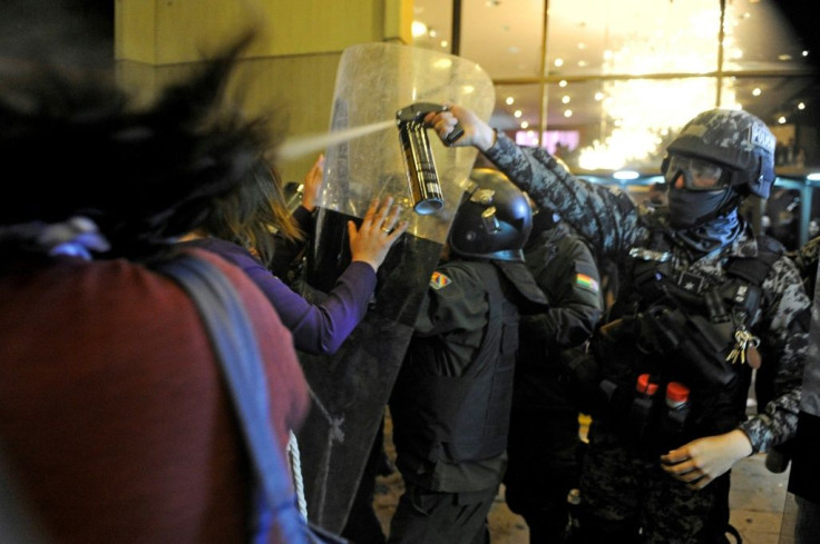 Supporters of Bolivia's main opposition presidential candidate have held protests outside key election count centers