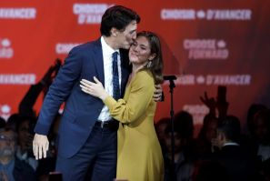 Canadian Prime Minister Justin Trudeau celebrated with his wife Sophie Gregoire after his Liberal Patry was declared winners or leading in a majority of the nation's electoral districts