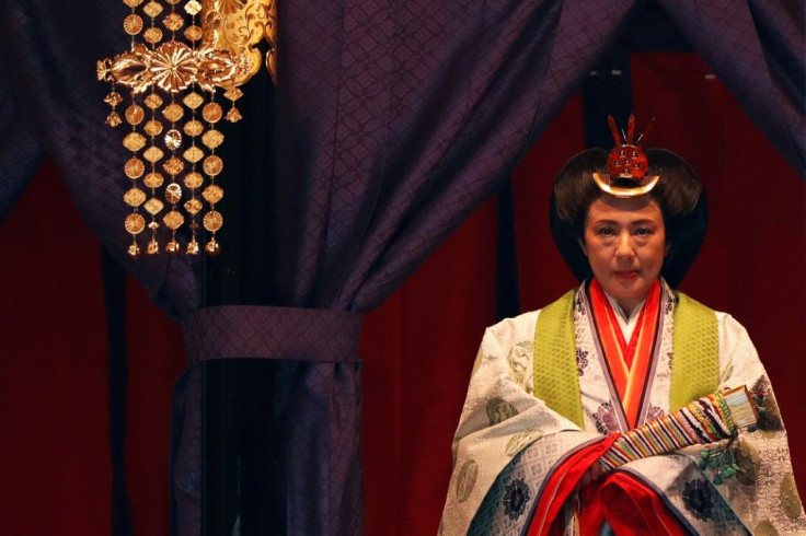 Empress Masako, a Harvard-educated former diplomat, remained silent during the ceremony