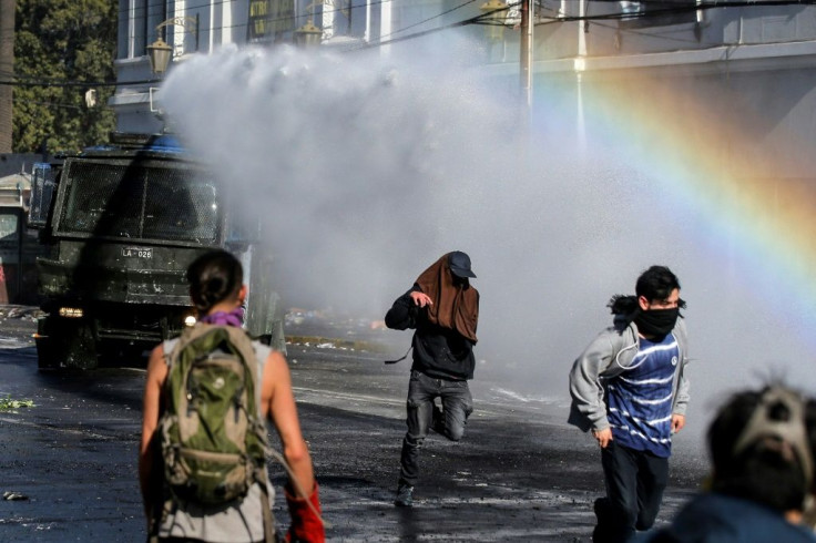 Chile's security forces have used tear gas and water cannons on the most unruly demonstrators