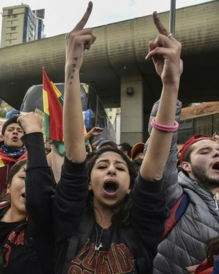 Bolivia braced for a general strike on Tuesday hours after violence broke out in several cities when the main opposition candidate rejected presidential election results