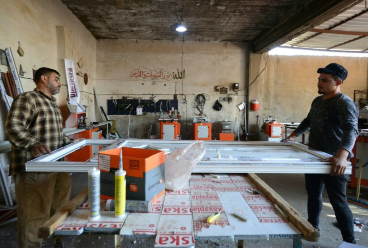 Hampering Mosul's recovery are the number of checkpoints dotting the roads out of the city, where reportedly 'armed groups' collect informal customs fees